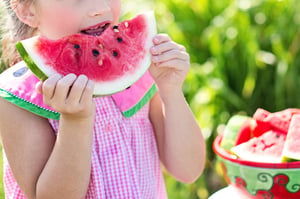 girl eating watermelon