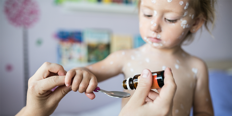 Girl Taking Medicine