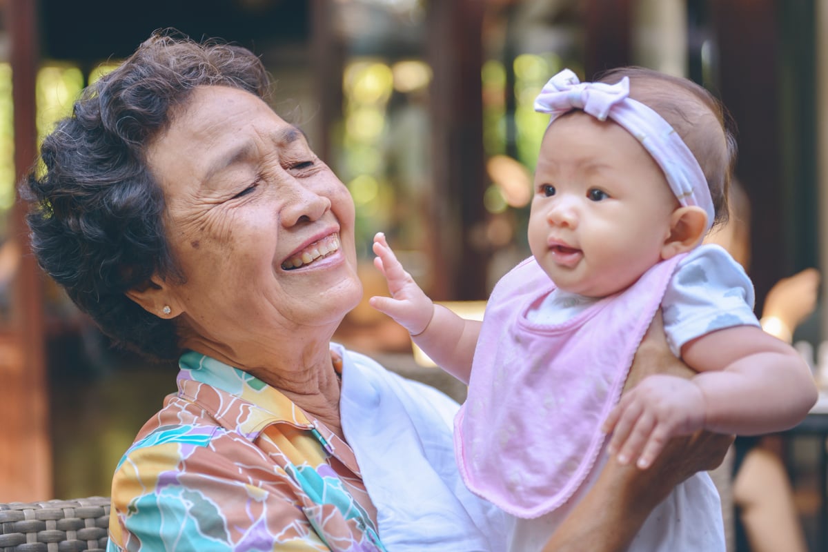 Grandmother with baby granddaughter