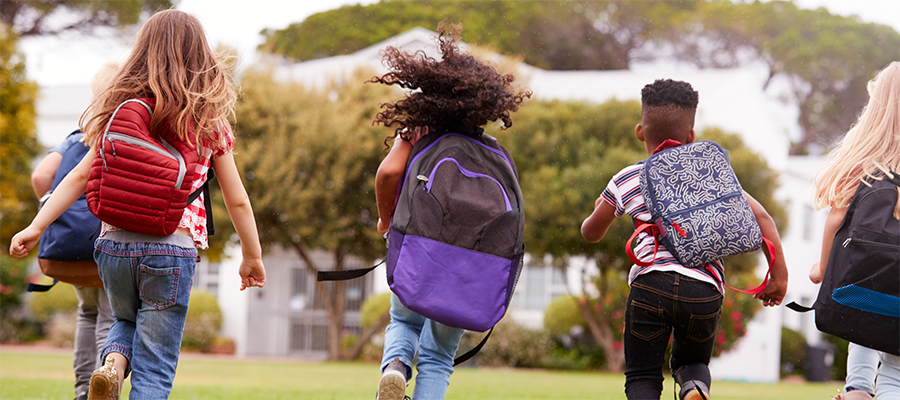 students running in playground